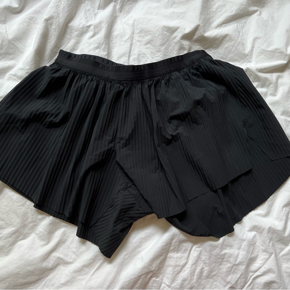 Nike Black Skorts with Elastic Waistband and Textured Fabric